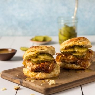 Chicken Biscuits Recipe with pickles on a cutting board