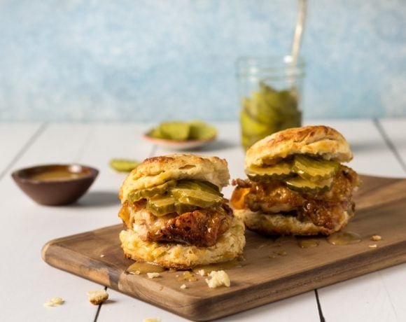 Chicken Biscuits Recipe with pickles on a cutting board