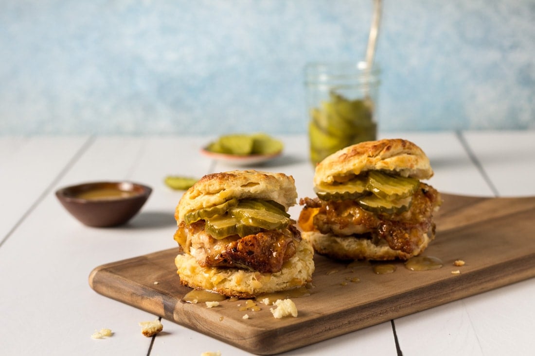 Chicken Biscuits Recipe with pickles on a cutting board