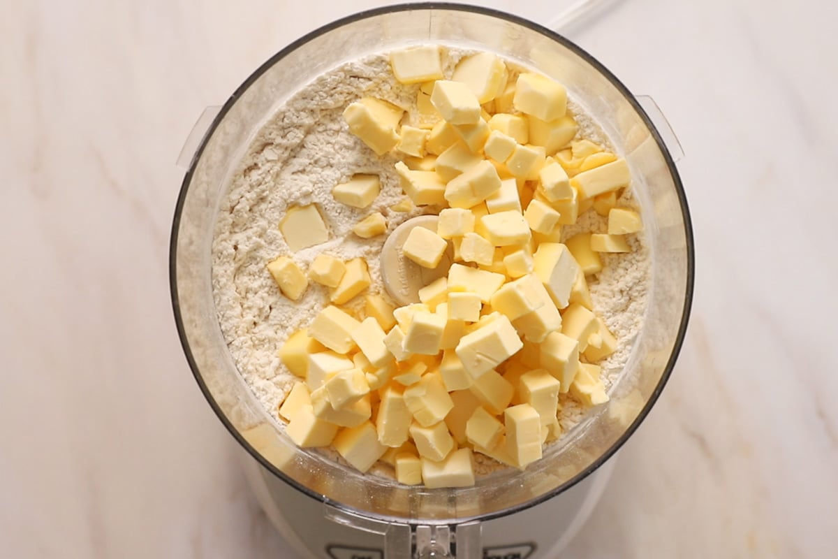 Cubes of butter and flour in a food processor