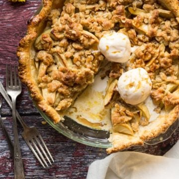 Apple Streusel Pie sliced with vanilla ice cream