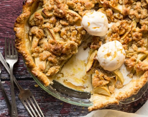 Apple Streusel Pie sliced with vanilla ice cream