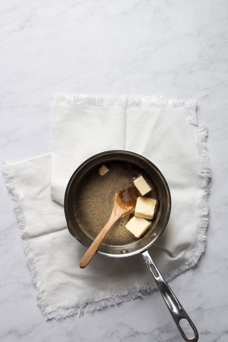 Bourbon glaze for apple streusel pie in a saucepan