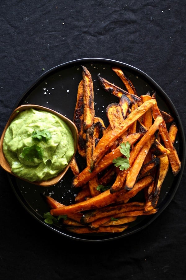 Smoky spicy baked sweet potato fries with avocado coconut dipping sauce