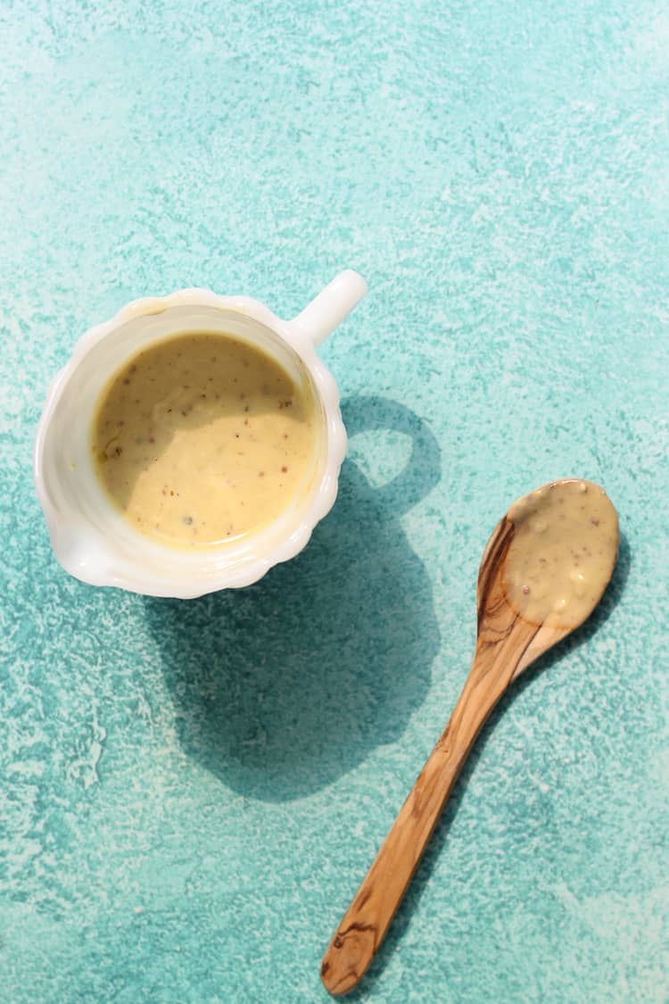 Caesar salad dressing recipe in a container