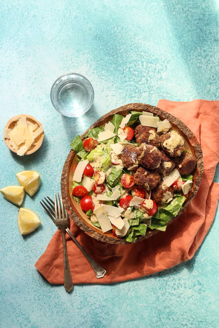 Easy lamb meatballs with caesar salad recipe in a bowl