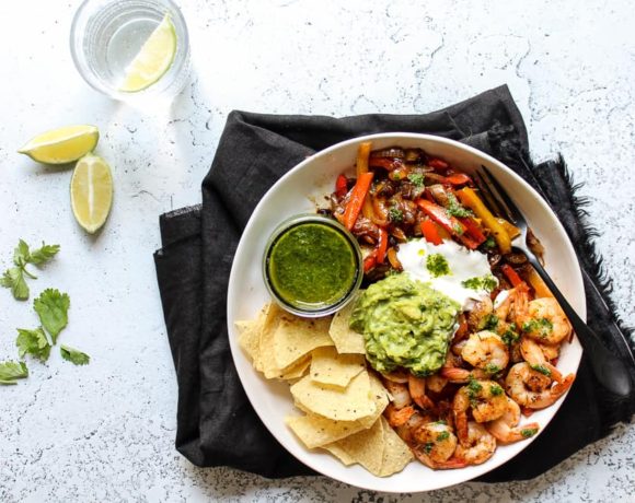 Shrimp fajita bowls with green chili chimichurri sauce and guacamole