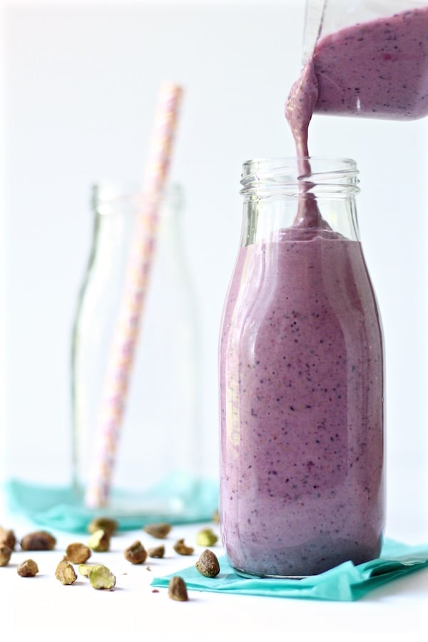 blueberry mango pistachio smoothie poured