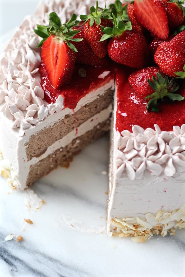 strawberry cake strawberry buttercream sliced