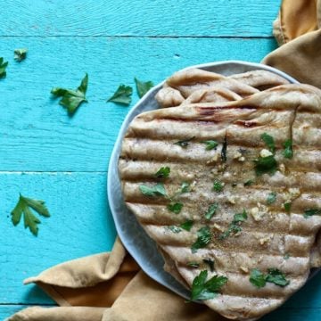 grilled garlic naan bread is the perfect flatbread for pizza, tacos, and as a side dish