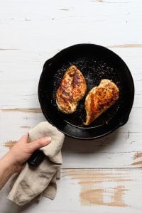 Grilled Chicken breasts in a cast iron skillet