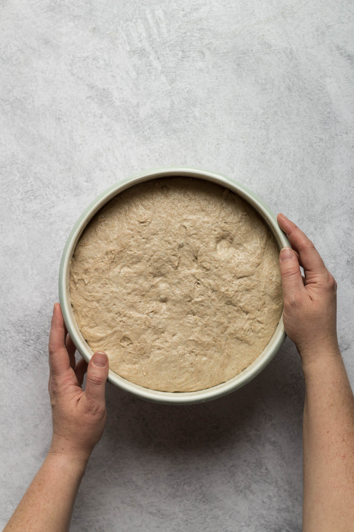 Bread dough in a bowl doubled in size