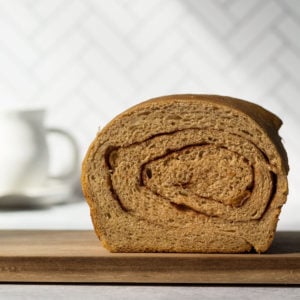 Sourdough cinnamon raisin bread on a cutting board