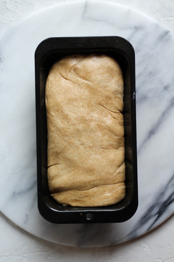 Sourdough Spelt Brioche Bread in a loaf pan