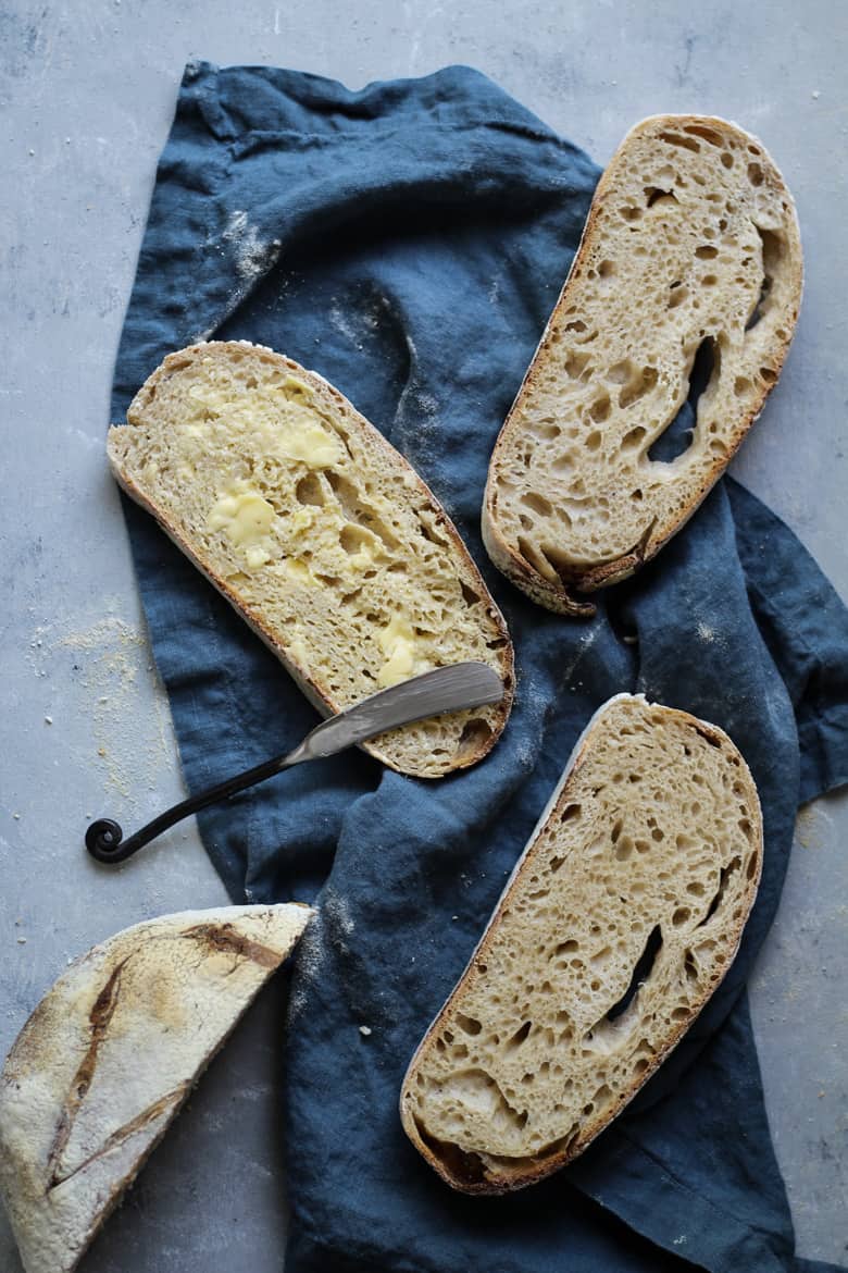 Sourdough bread recipe sliced with butter