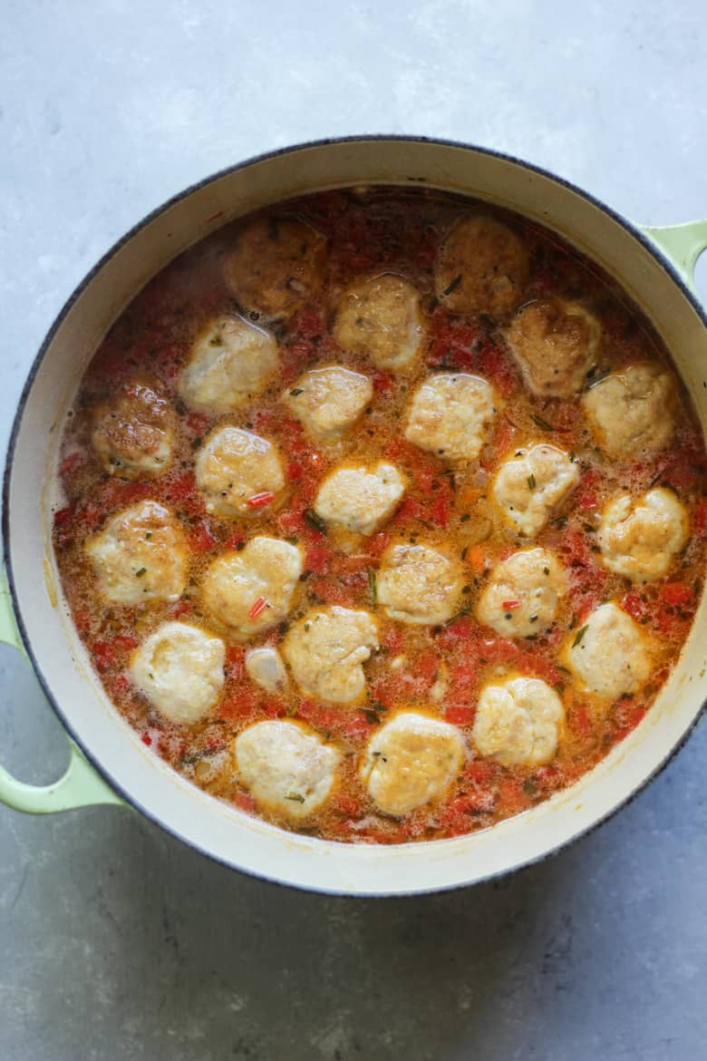 Bone Broth Whit Bean Chicken Meatball soup with Pesto in a dutch oven