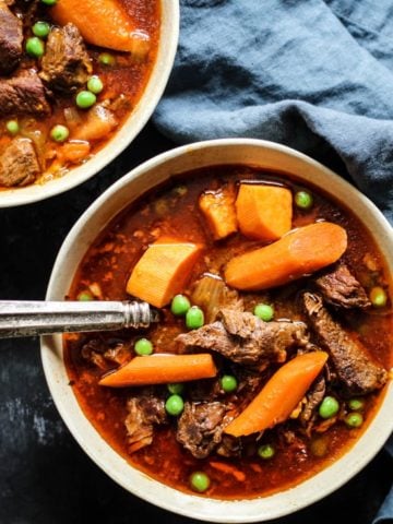 Bone Broth Instant Pot Beef Stew Recipe with carrots, onion, and peas