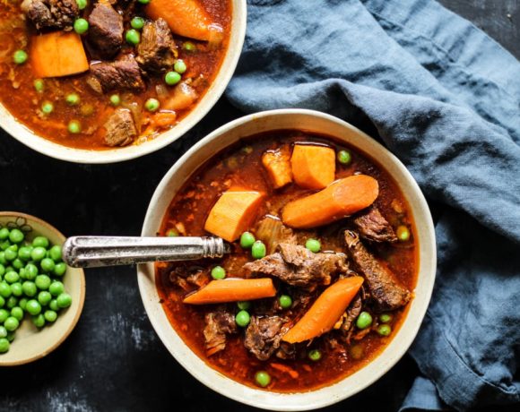 Bone Broth Instant Pot Beef Stew Recipe with carrots, onion, and peas