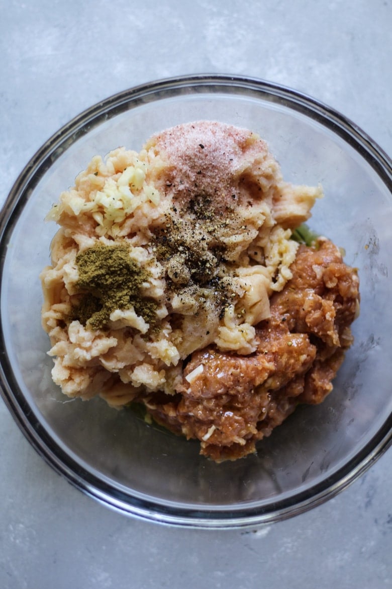 Chicken meatball ingredients in a bowl