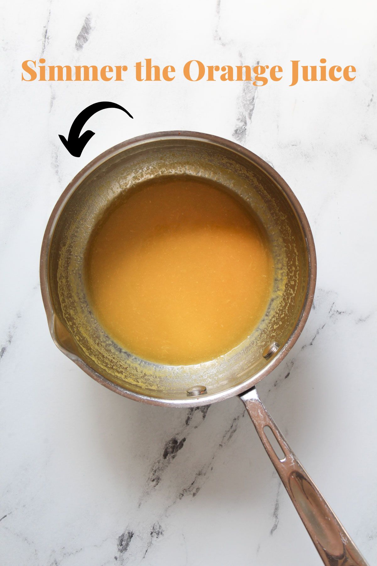 Orange juice in a sauce pan