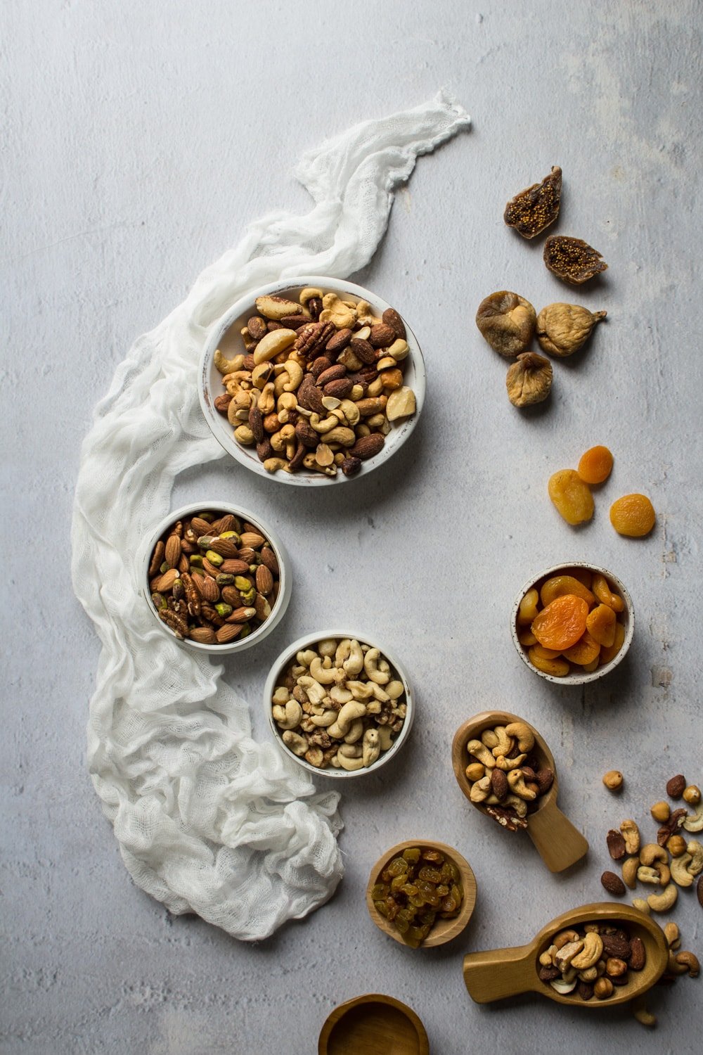 Nuts and dried fruit for a charcuterie cheese board