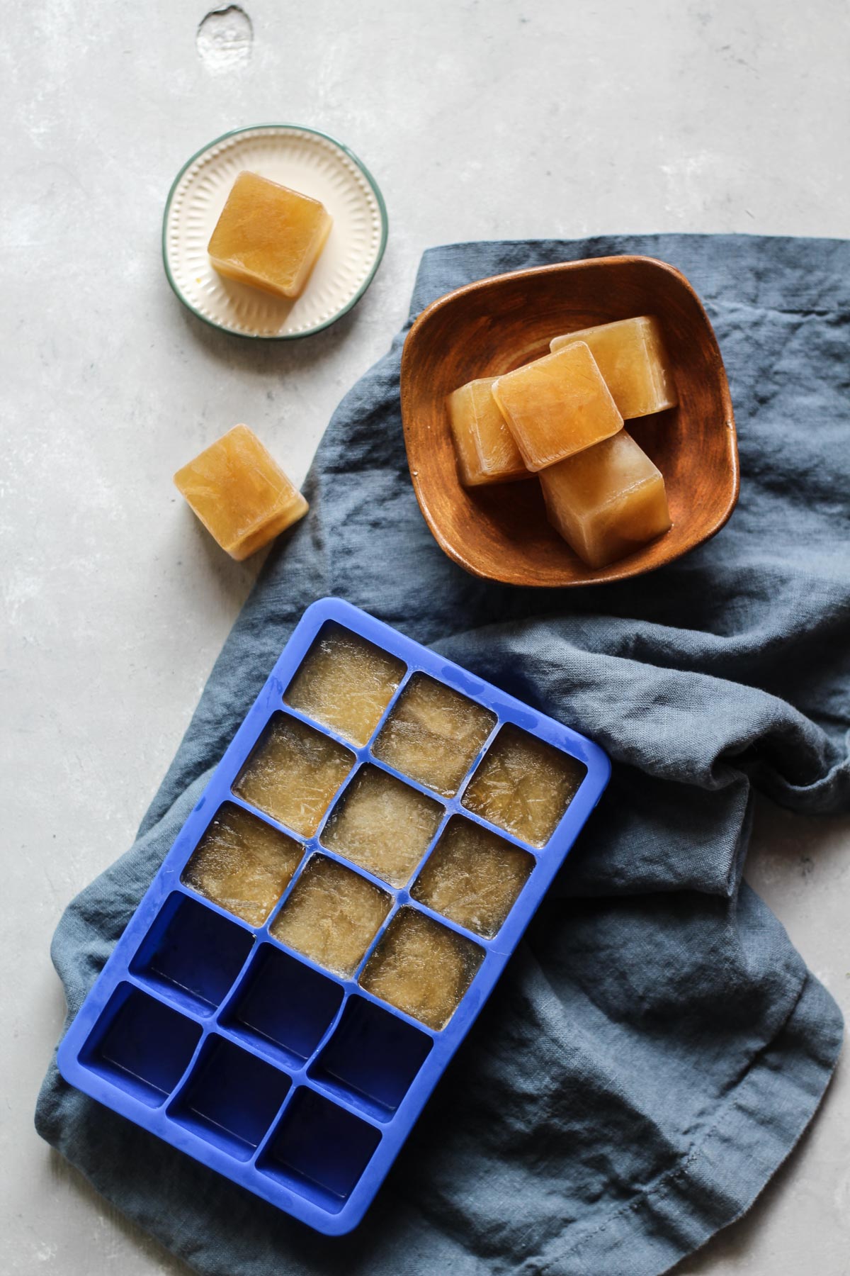 chicken broth ice cubes with a linen napkin