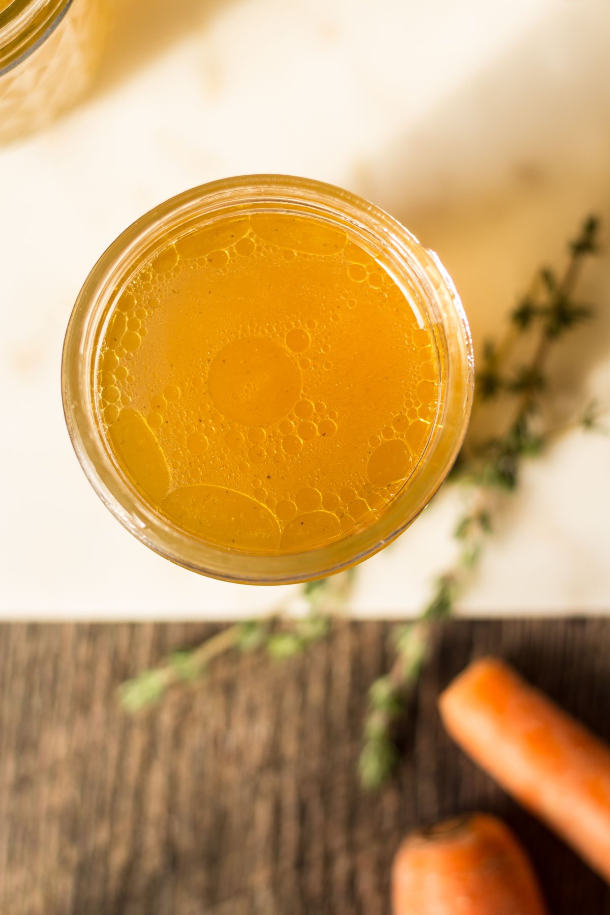 Chicken stock in a jar close up