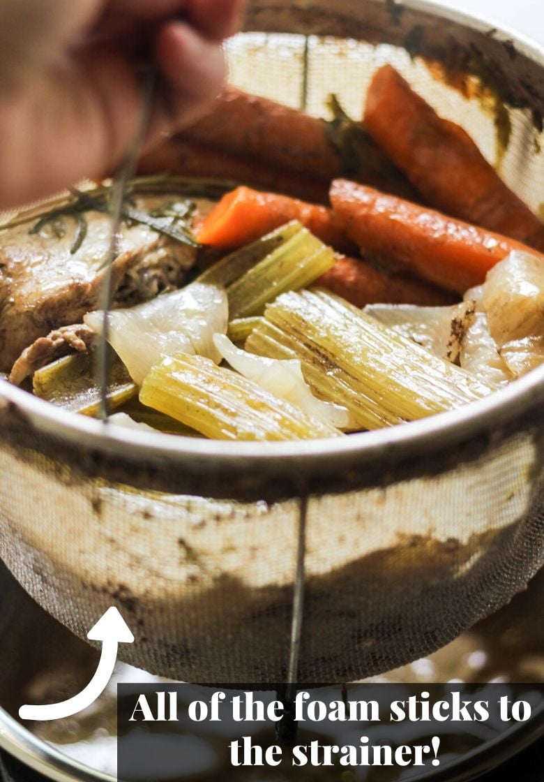 Strainer with vegetables and bones