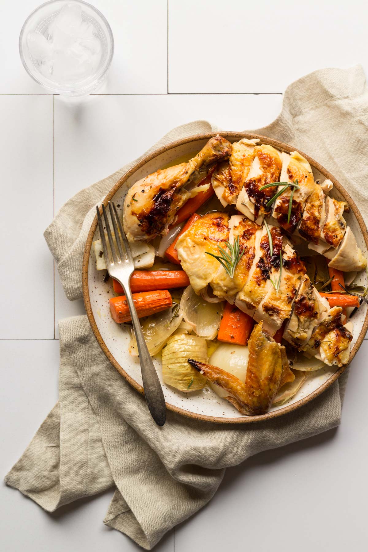 Sliced chicken and carrots on a plate