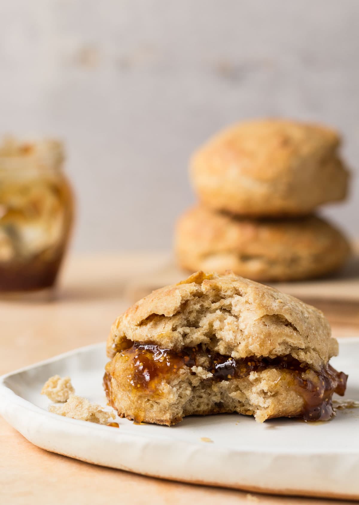 Sourdough biscuits on a plate with jam