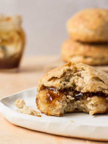 Sourdough biscuits with fig jam on a plate