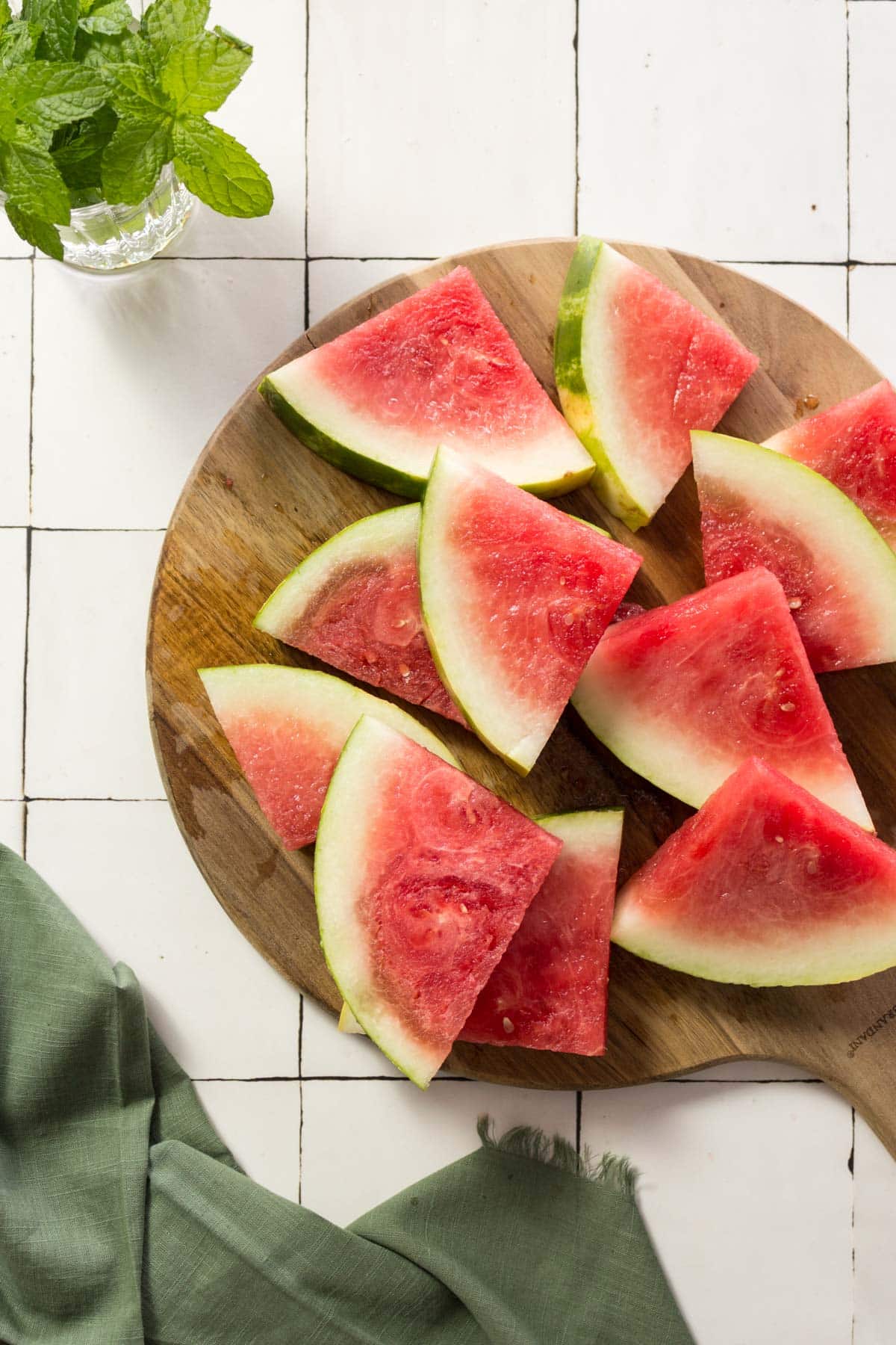 Slices of watermelon on a wooden board