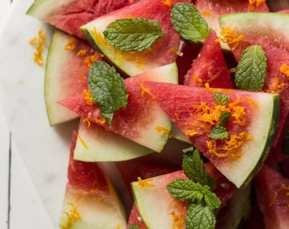 Watermelon triangles with mint on a plate