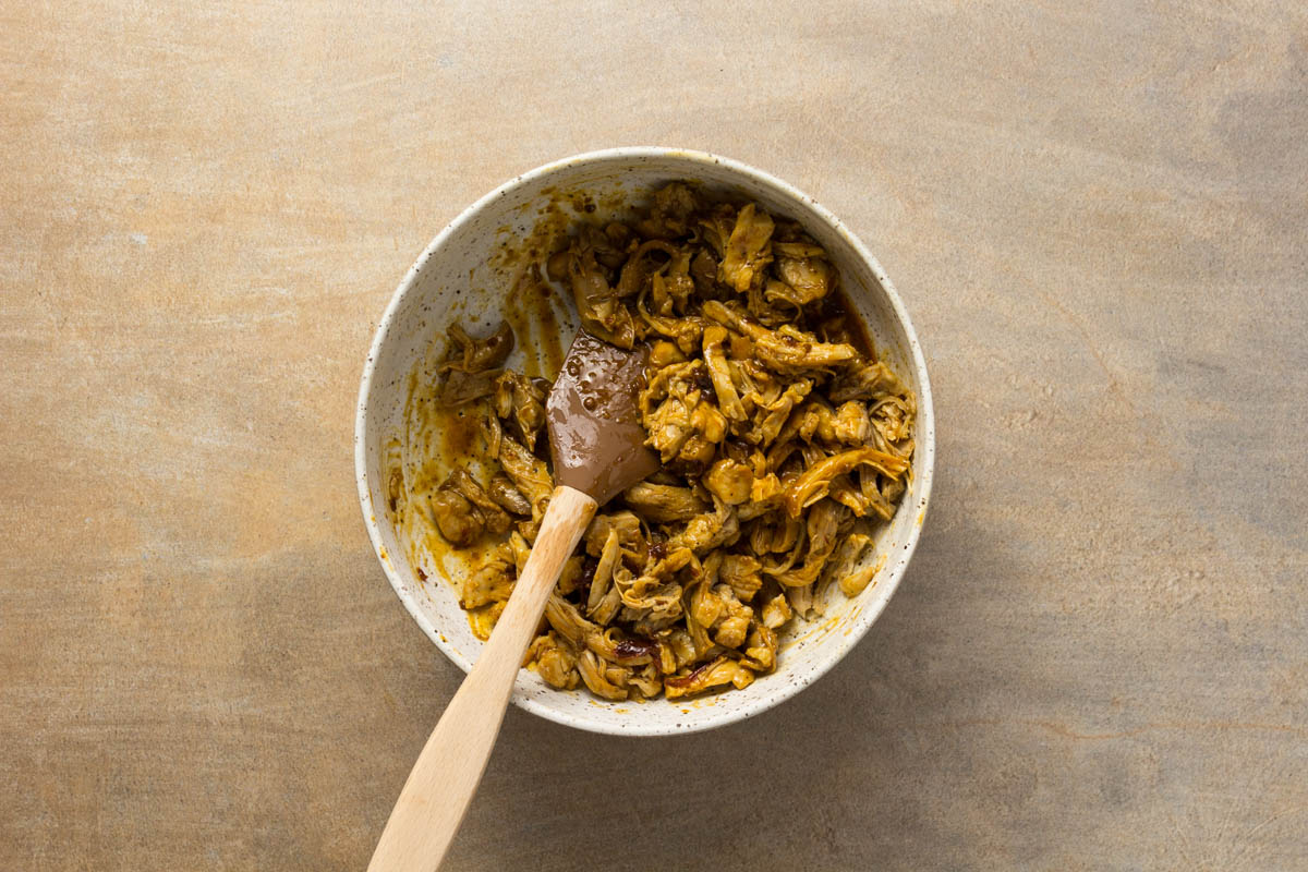 Chipotle orange chicken shredded in a bowl