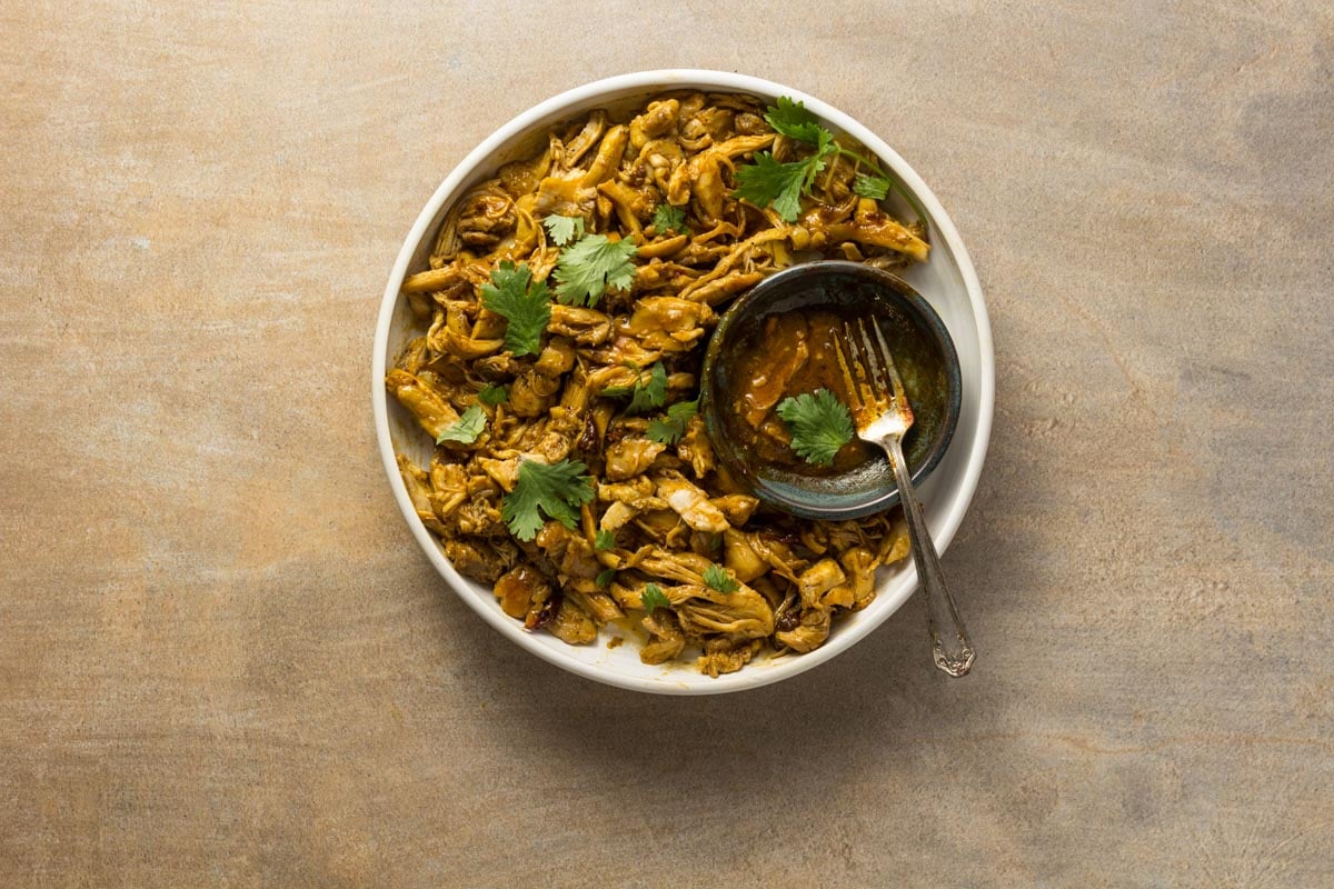 Chipotle orange chicken in a bowl with cilantro