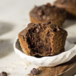 Double chocolate chip muffins in a pottery bowl