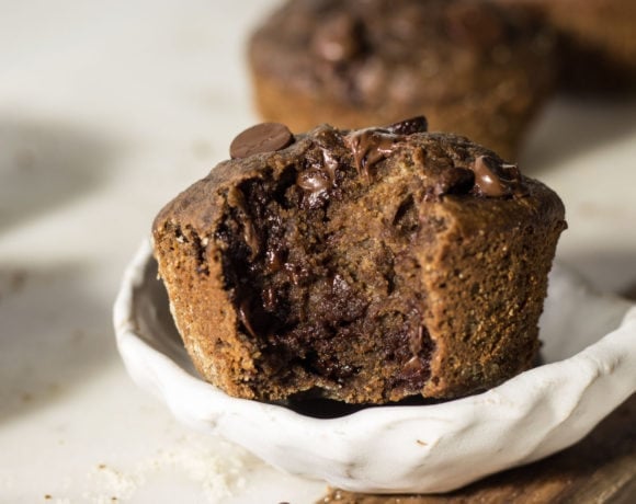 Double chocolate chip muffins in a pottery bowl