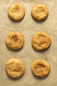 Chai Snickerdoodles baked on parchment paper