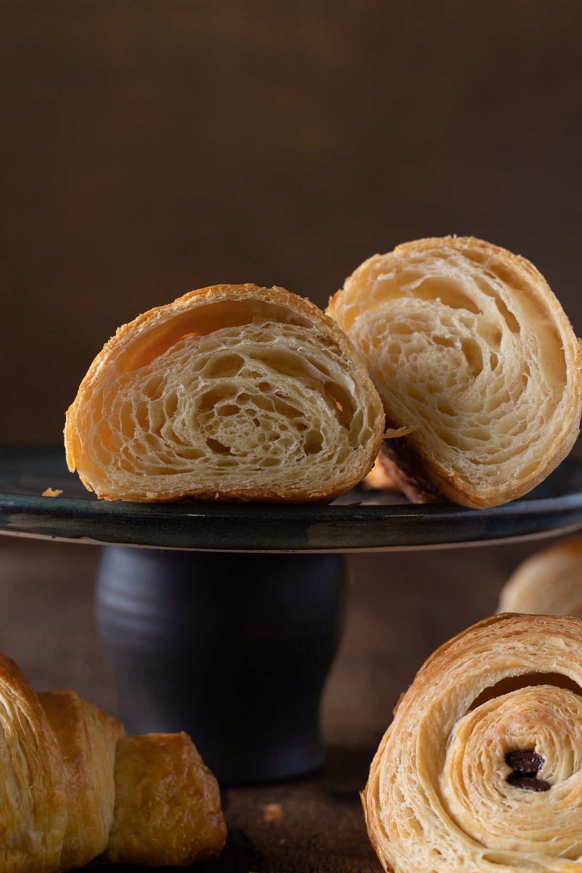 Croissants on a black plate