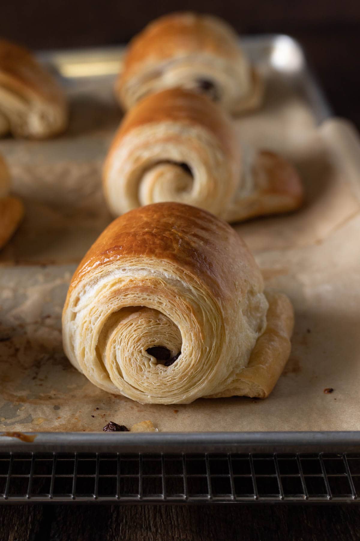 Chocolate croissants on a sheet pan
