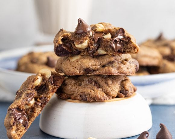 Double chocolate chip cookies stacked on a bowl