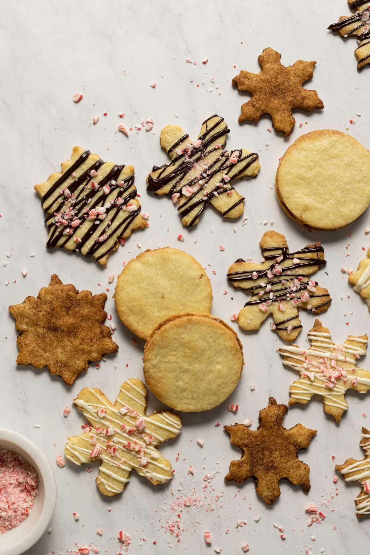 Almond cookies decorated with dark chocolate, chai spice, and white chocolate