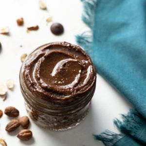 Avocado nutella in a jar with a linen napkin