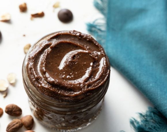 Avocado nutella in a jar with a linen napkin