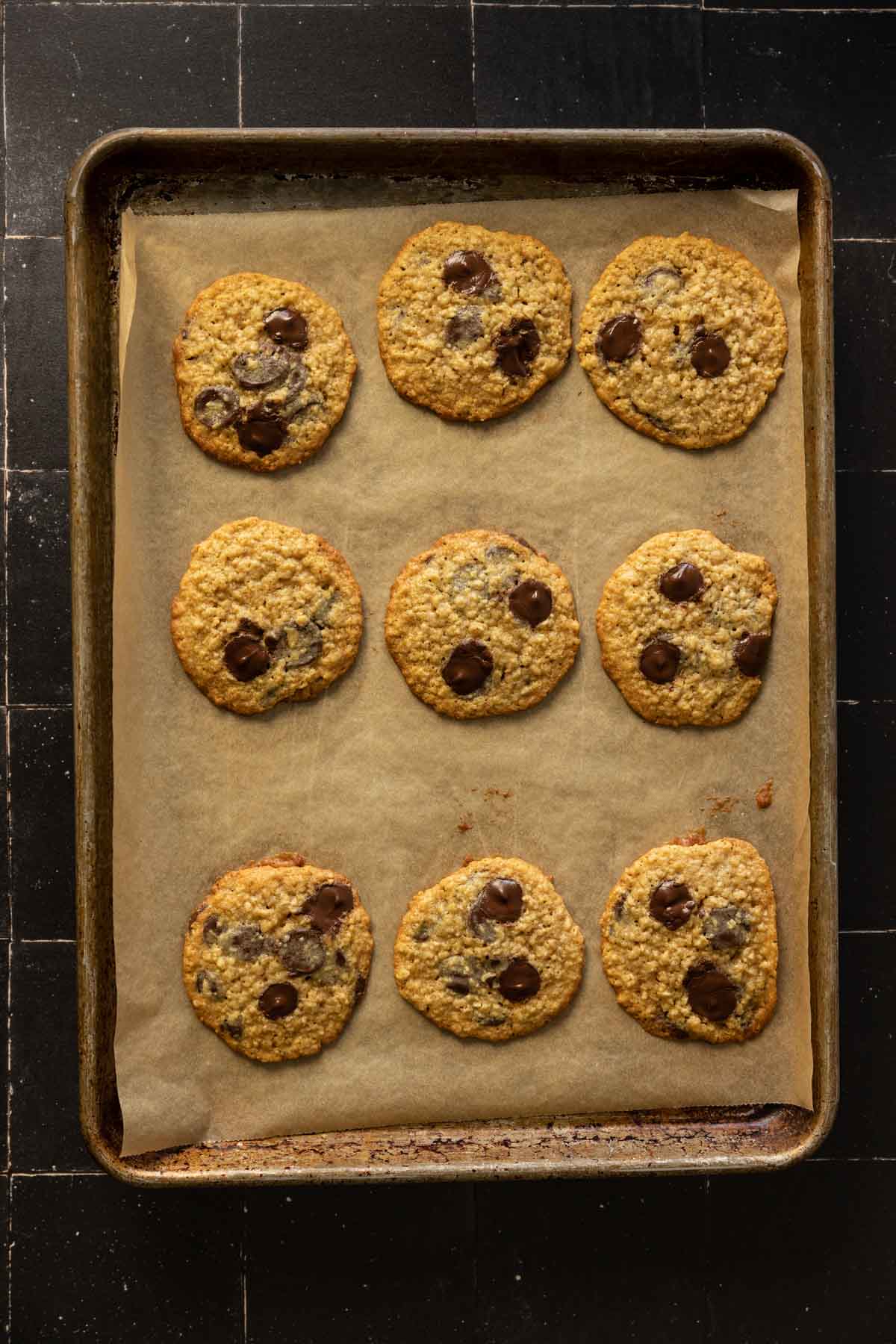 oatmeal chocolate chip cookies on a sheet pan