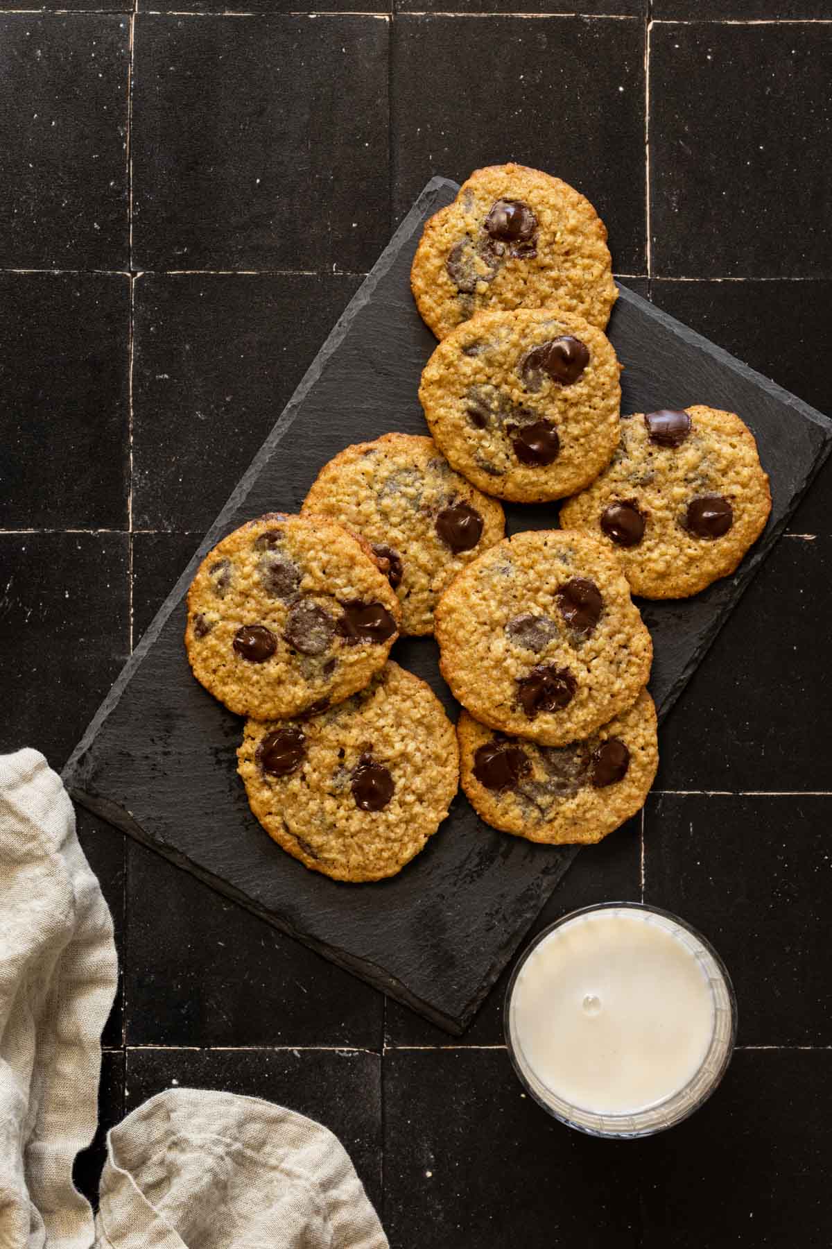 oatmeal chocolate chip cookies with a glass of milk
