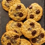 Oatmeal chocolate chip cookies on slate tile