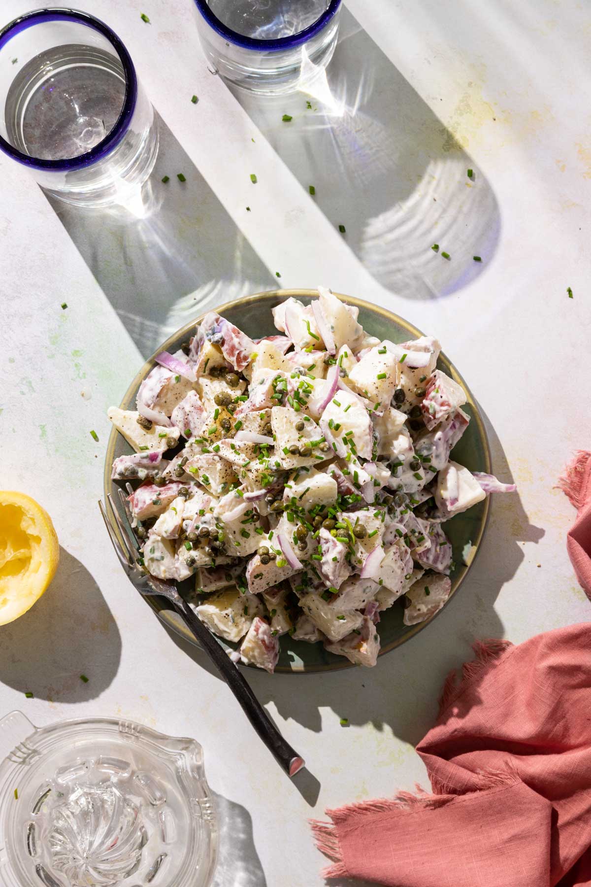 Creme Fraiche potato salad with glasses of water