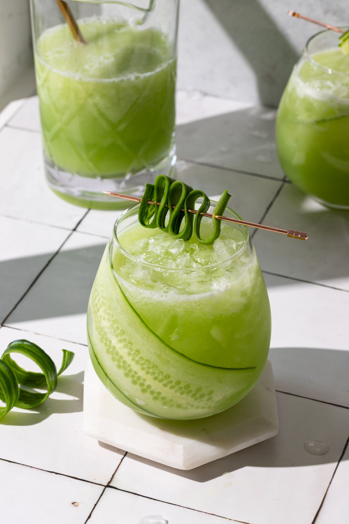 Cucumber drink with a cucumber garnish in a glass