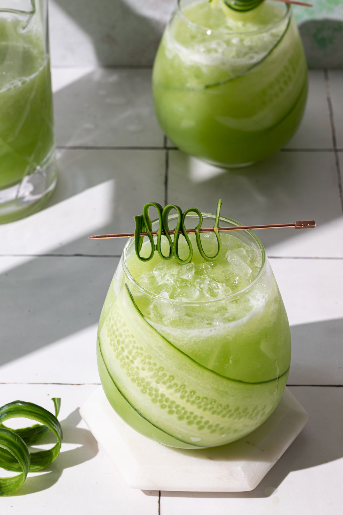 Cucumber drink with a cucumber slice in glasses